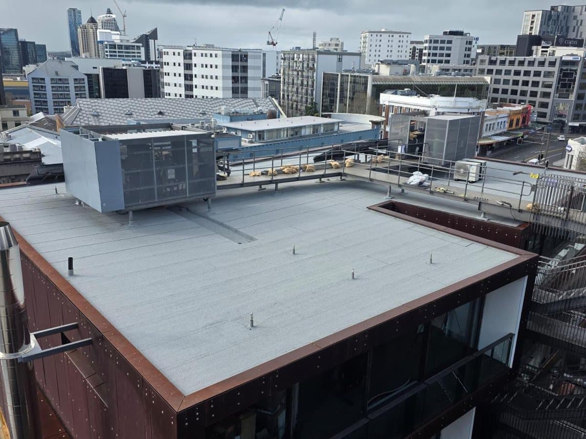 Urban flat roof project — Durable flat roof waterproofing for a central city building. Membrane Roofing Systems, Auckland NZ.